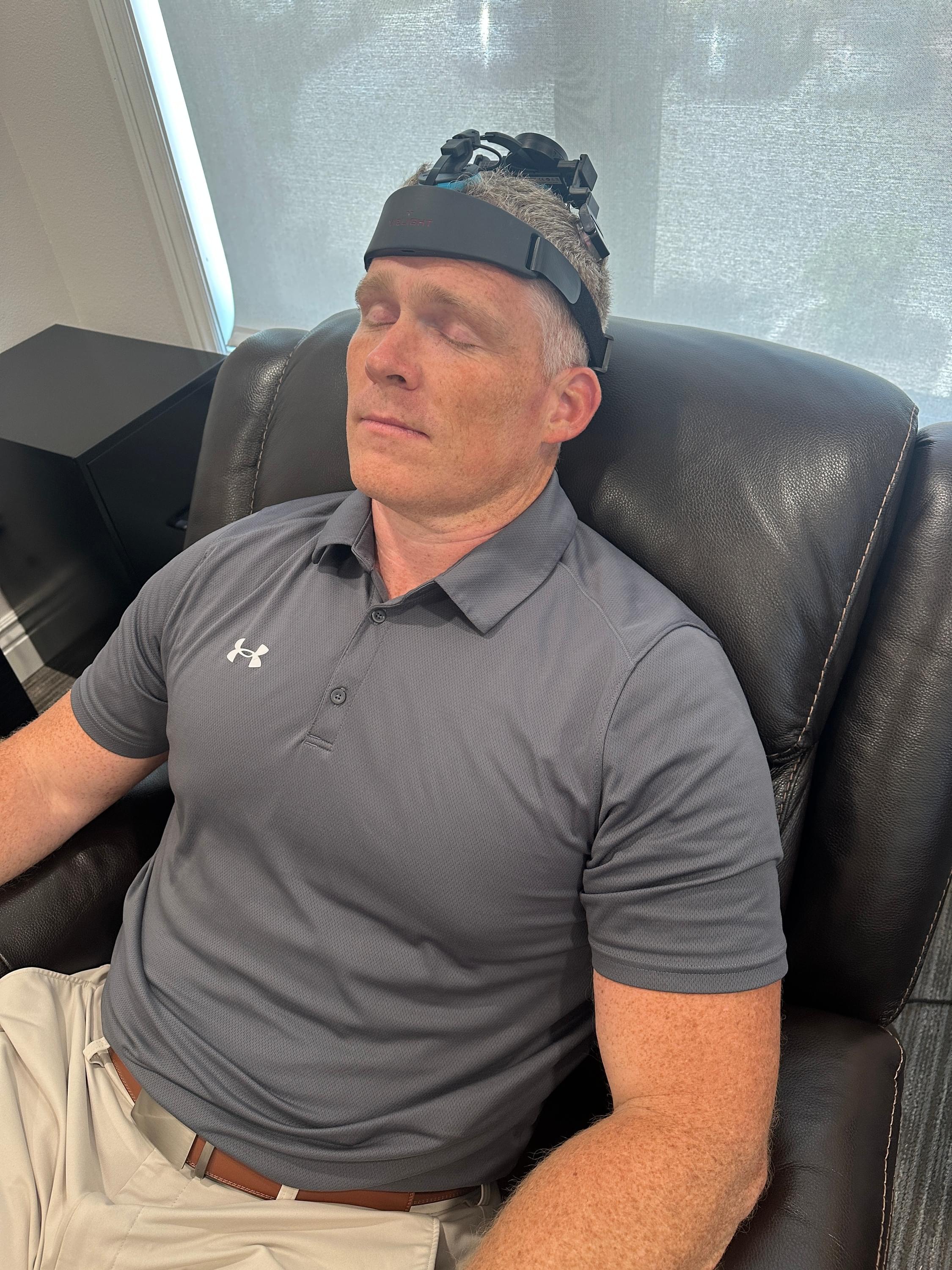 Patient receiving Calmare Scrambler Therapy at Stronglife Physiotherapy in Provo Utah for neuropathy, CRPS, sciatica, and chronic nerve pain relief